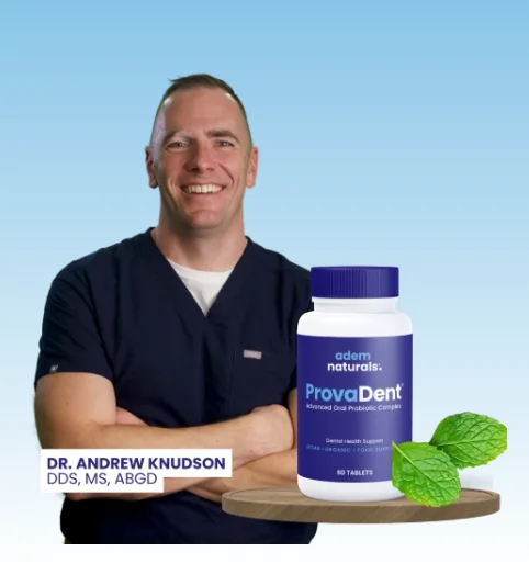 Dr. Andrew Knudson, DDS, holding a bottle of ProvaDent oral probiotic